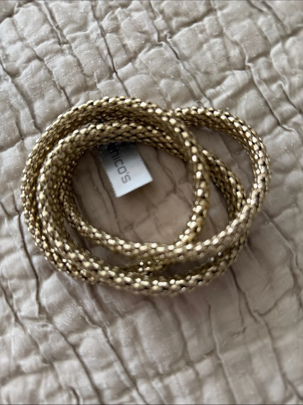 Set of three new with tags gold tone bracelet stretch